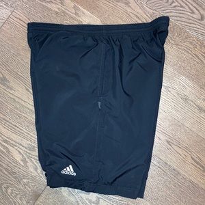 Men’s black Adidas shorts.
